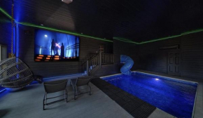 Dream Maker Lodge: 12-Bedroom Smoky Mountain Cabin with Pool, Hot Tubs, Theater, and Game Room